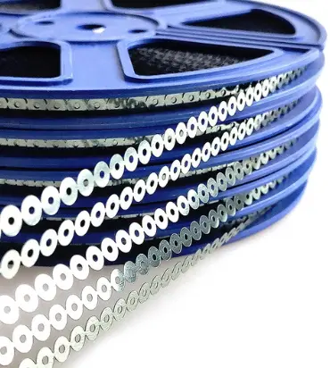 Silver sequins on a blue reel